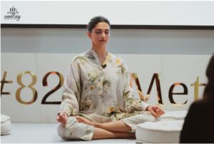 Deepika Padukone sitting in a lotus position on the day of the launch of her brand, 82 east. Experiential marketing
