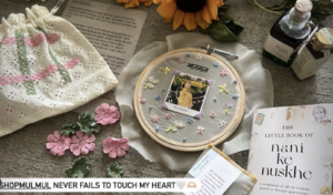 a embroidery hoop with flowers and a picture on it. Mulmul's experiential marketing campaign